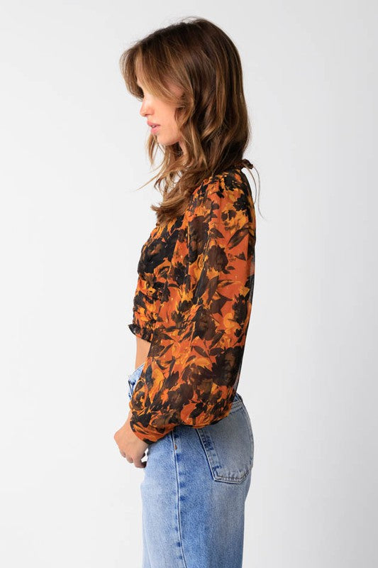 Eloise Ruffle Floral Top in Black/Orange