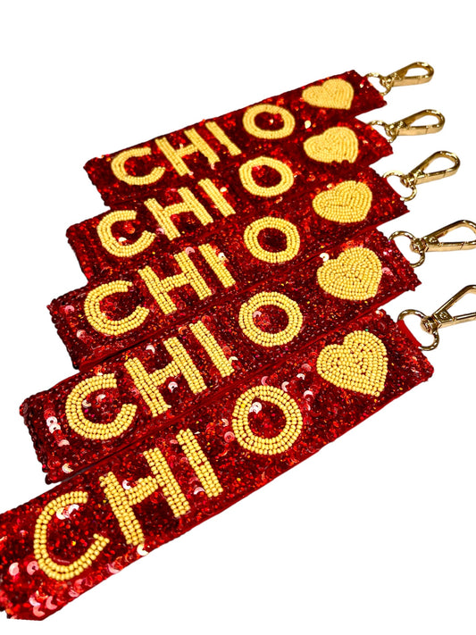 Chi Omega Heart Sequin Wristlet