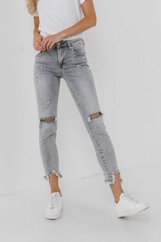 Johnson Mid Rise Distressed Skinnies